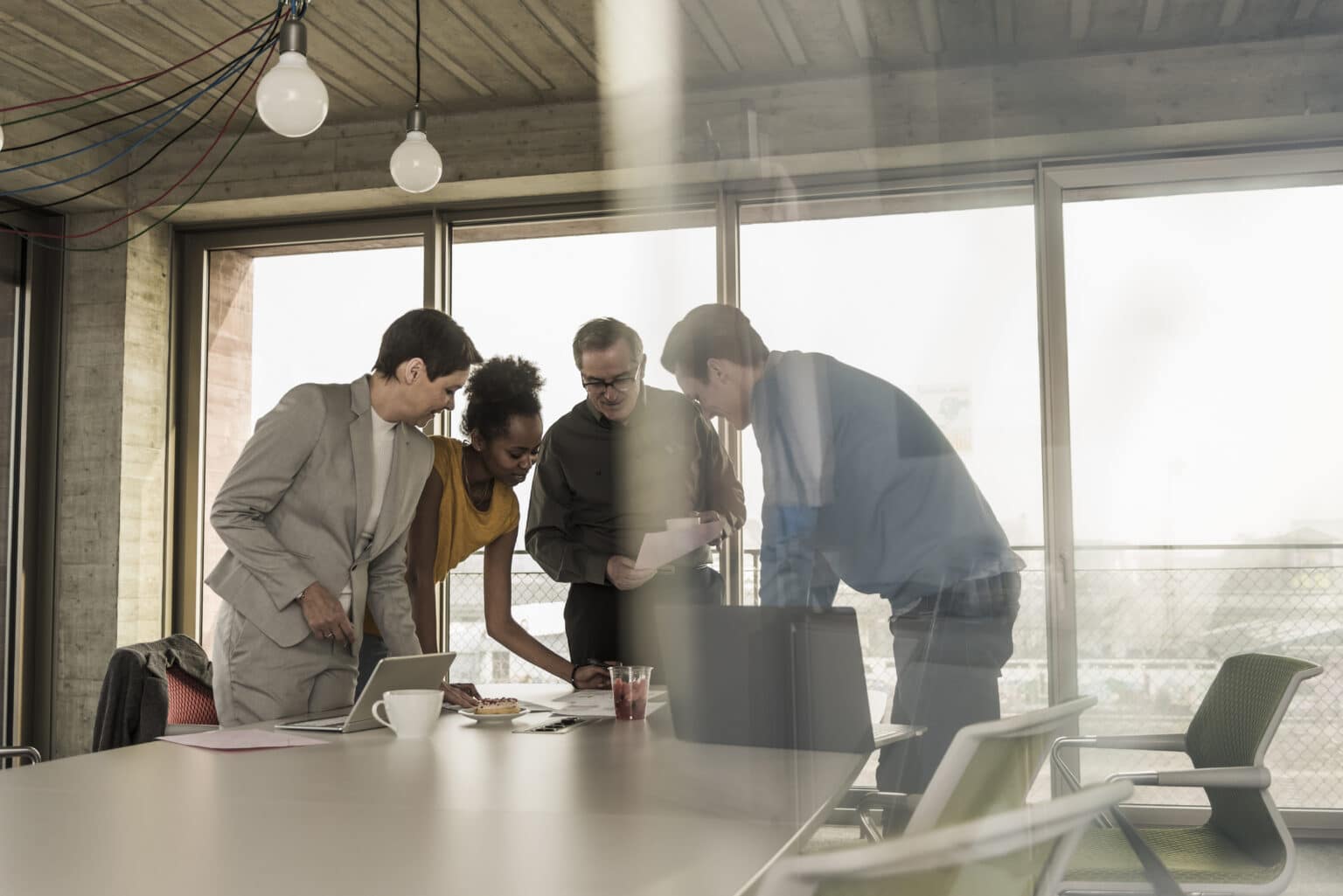 Business meeting in an office with a group using the scaling up method of a standing daily meeting