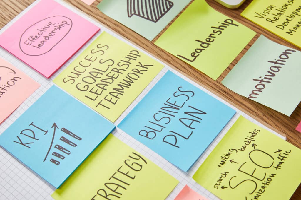 Paper stickers with kpi and other business terms on them