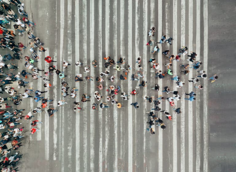 Successful business plan concept with high Angle View Of People forming and arrow on the street