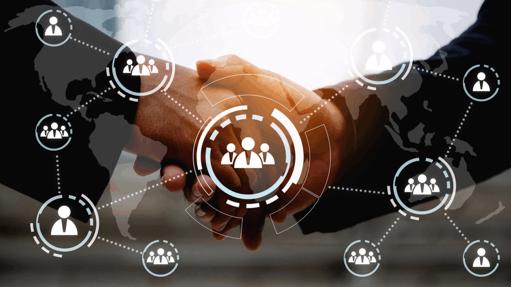 Two professionals shaking hands, overlaid with network icons connecting people across a world map to symbolize global business collaboration.