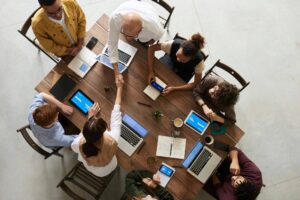 Group collaborating around a conference table.