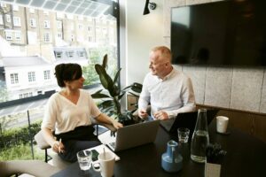 Business meeting in modern office setting.
